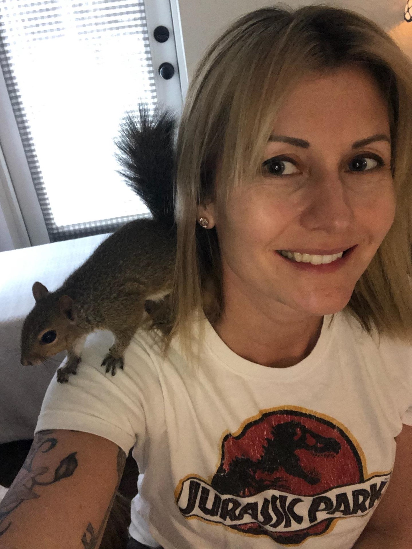 Jenn rescued and raised a baby squirrel
